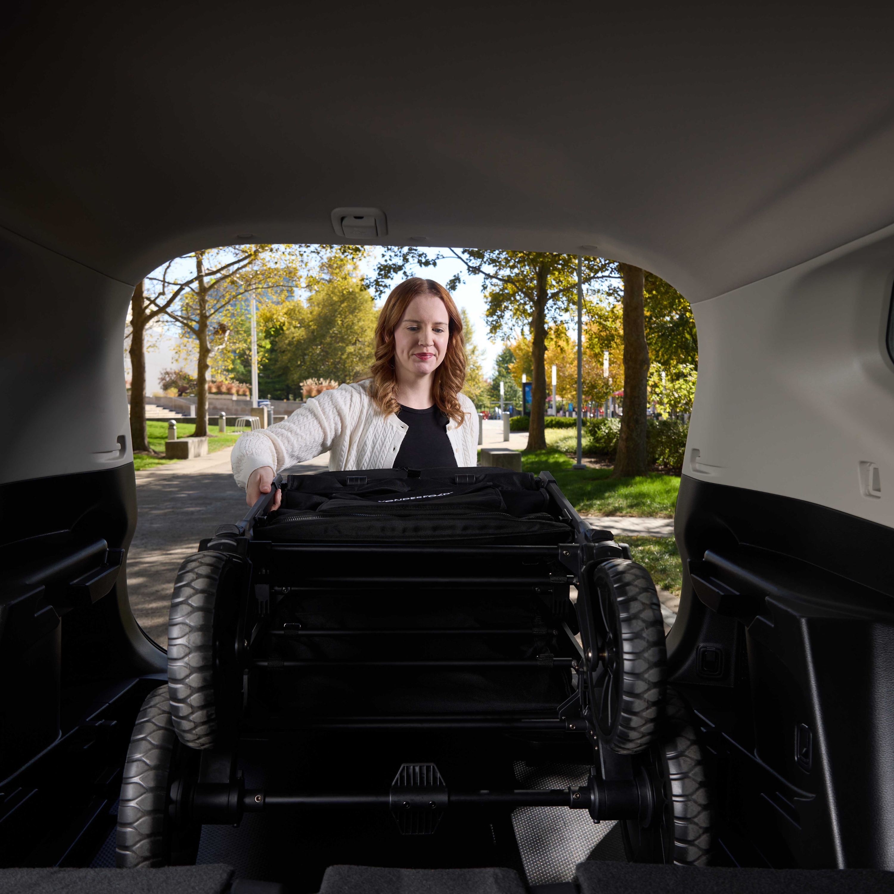 Wonderfold W4 Luxe Pro Quad Stroller Wagon